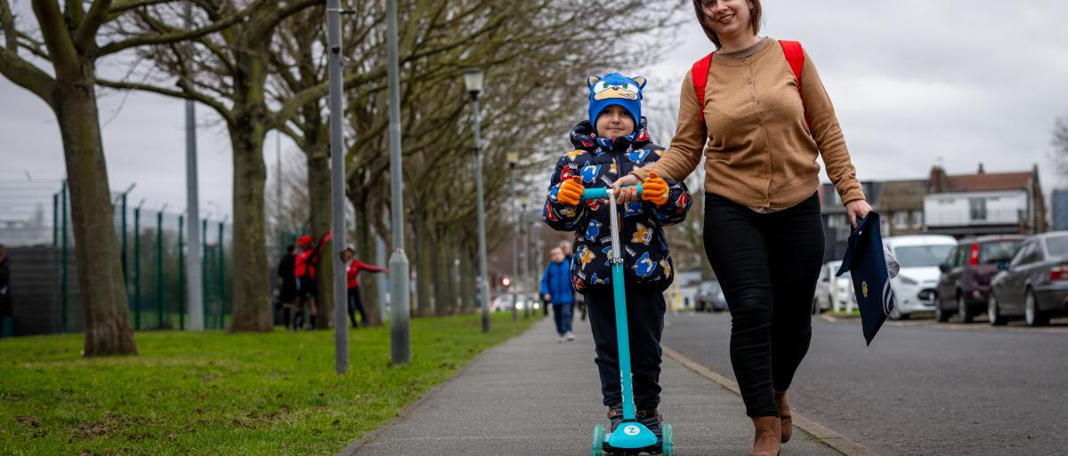 Mother and son walking
