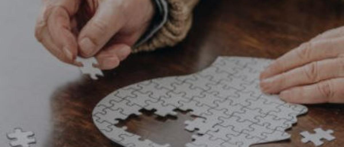 Someone doing a puzzle