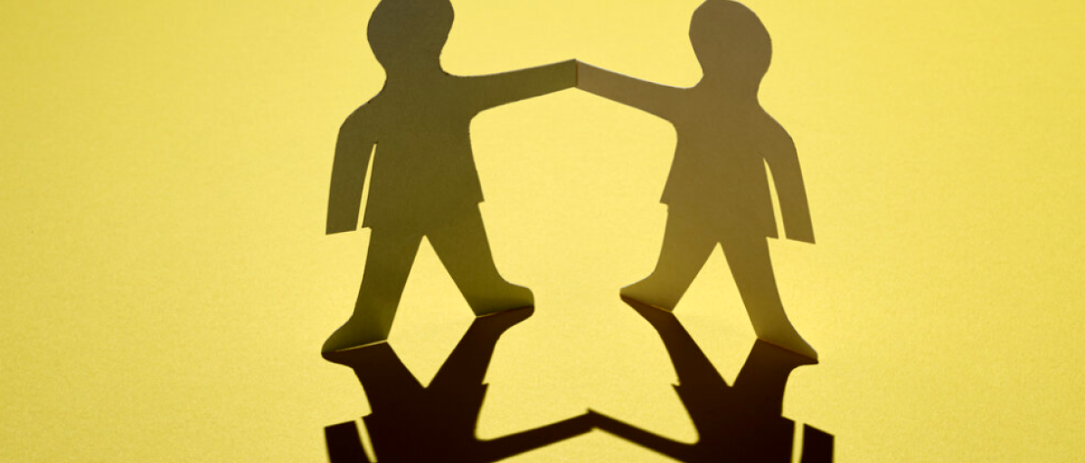 Graphic of people holding hands