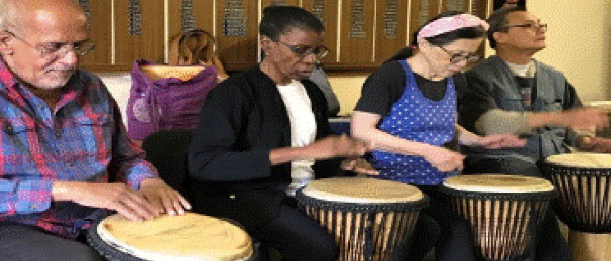 People drumming 