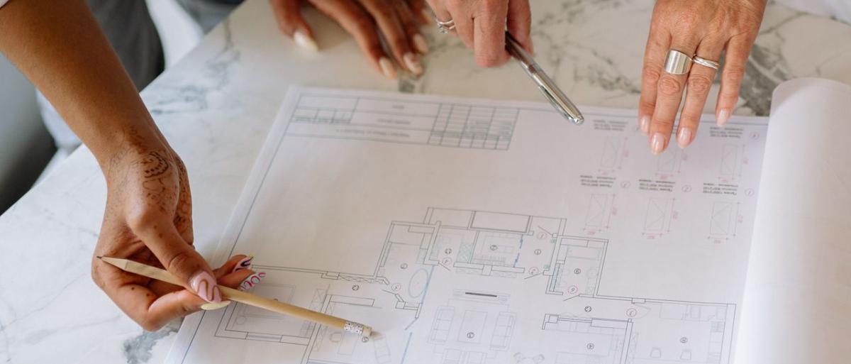 Architects looking at a building plan