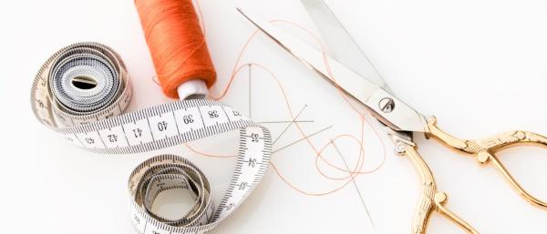 Thread, tape rule and scisscors 