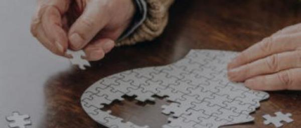 Someone doing a puzzle