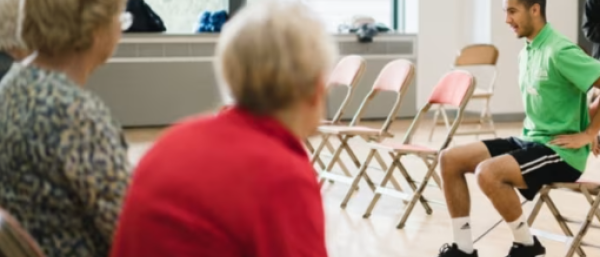 Elderly people watching a coach