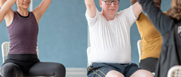 People doing chair based exercise