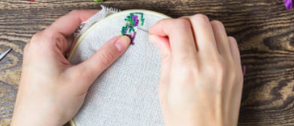 Someone doing embroidery stiches