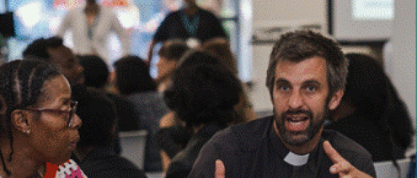 People talking at a round table