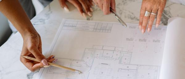 Architects looking at a building plan