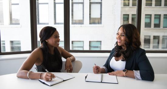 Two women chatting