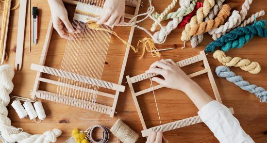 Two people doing craft together