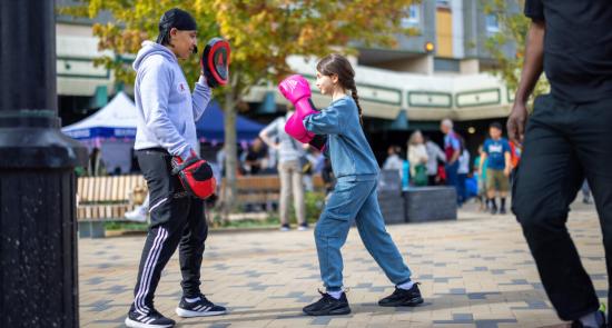 Young boy and girl doing a boxing activity together