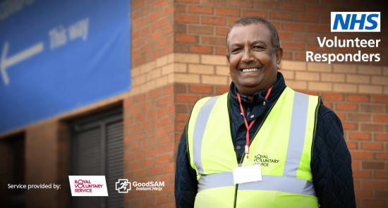 Man smiling wearing a hi-vis jacket