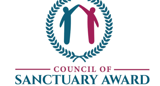 Graphic logo of two people holding  hands above their heads with  a text of council of sanctuary awards written below